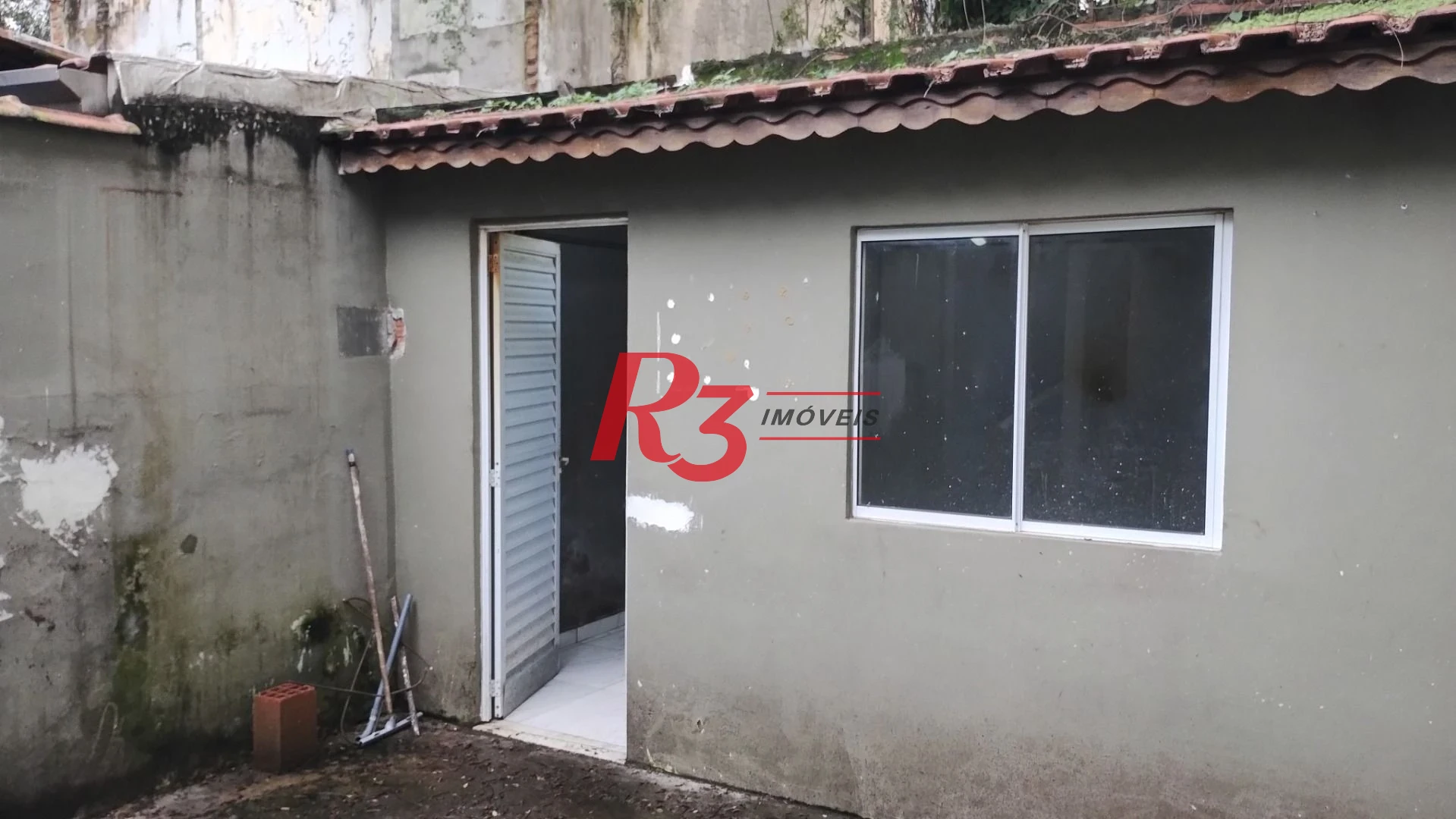 Casa com 3 dormitórios para alugar, 127 m² por R$ 6.424,34/mês - Boqueirão - Santos/SP