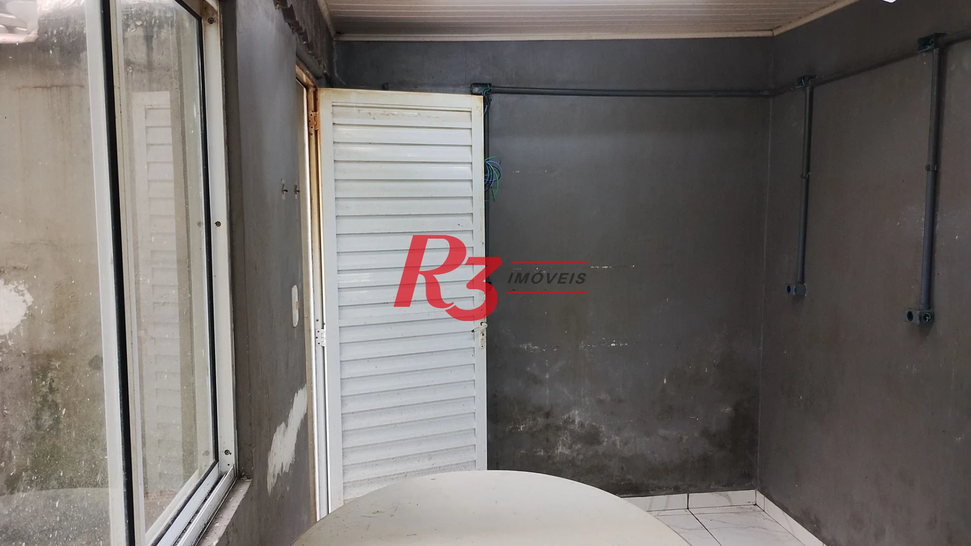 Casa com 3 dormitórios para alugar, 127 m² por R$ 6.424,34/mês - Boqueirão - Santos/SP