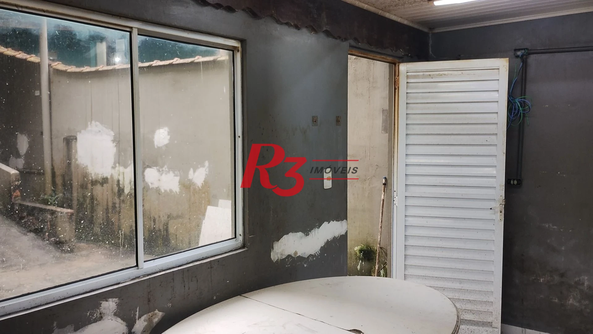 Casa com 3 dormitórios para alugar, 127 m² por R$ 6.424,34/mês - Boqueirão - Santos/SP