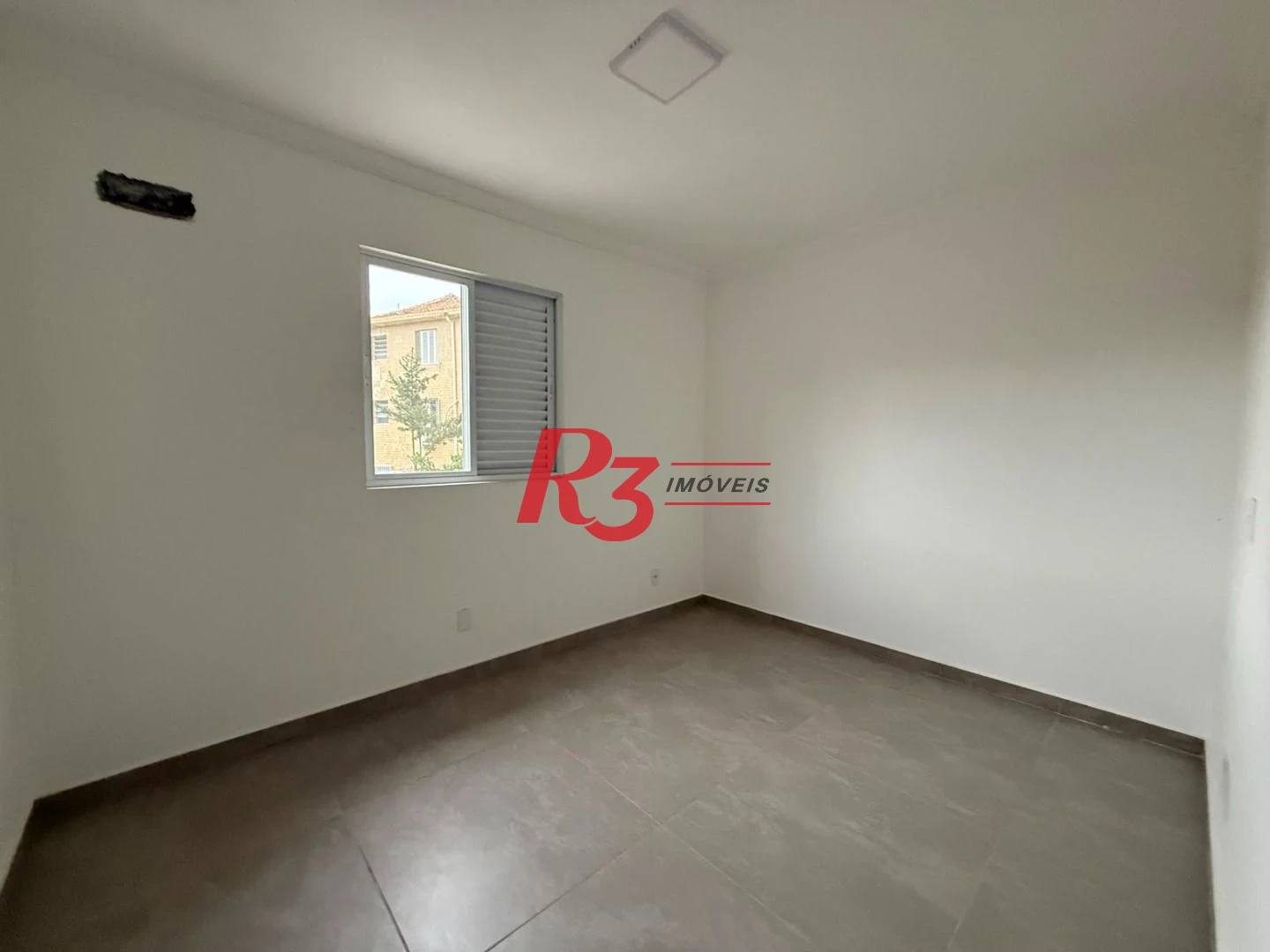 Apartamento com 2 dormitórios à venda, 65 m² por R$ 520.000,00 - Macuco - Santos/SP