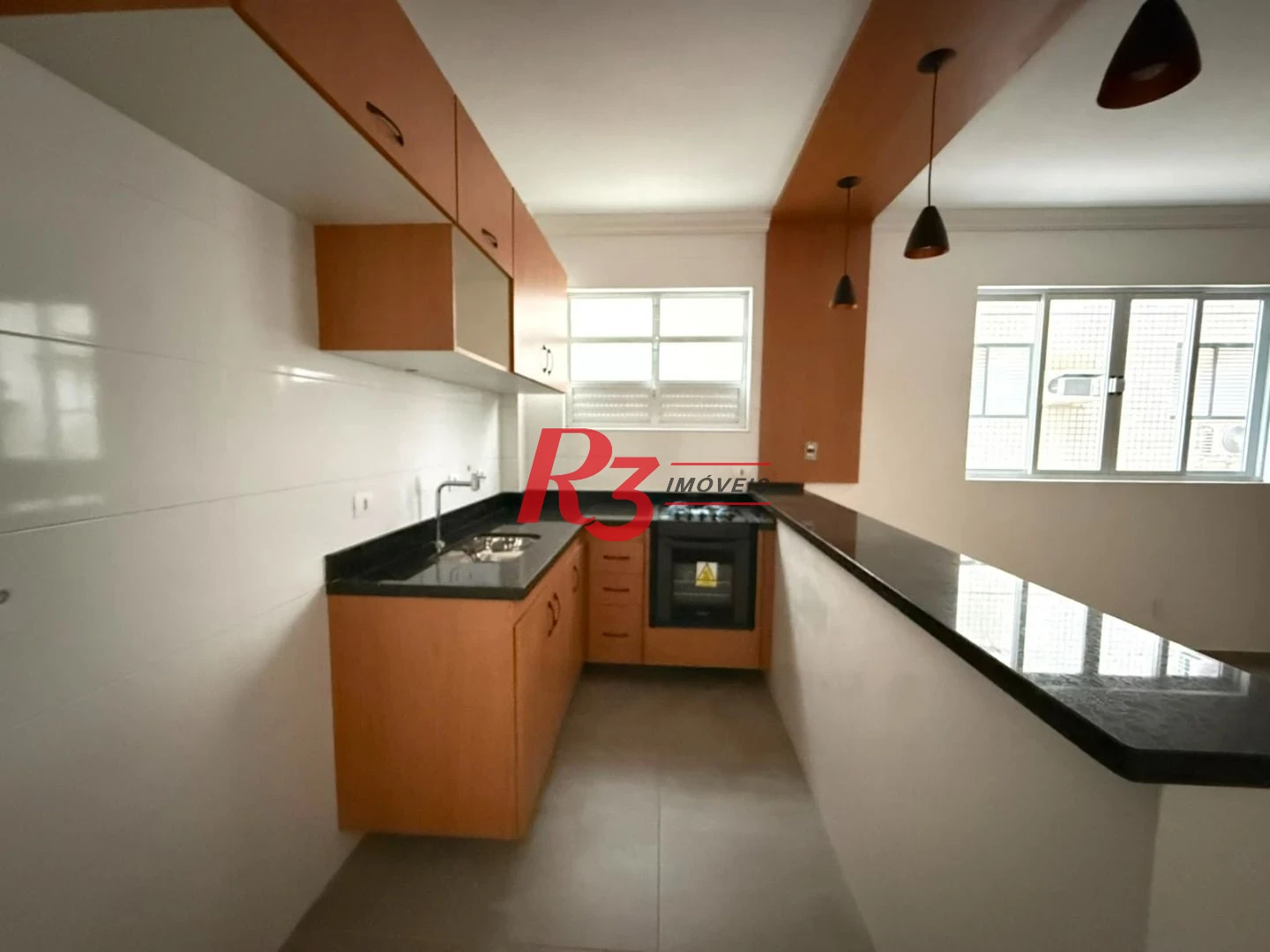 Apartamento com 2 dormitórios à venda, 65 m² por R$ 520.000,00 - Macuco - Santos/SP