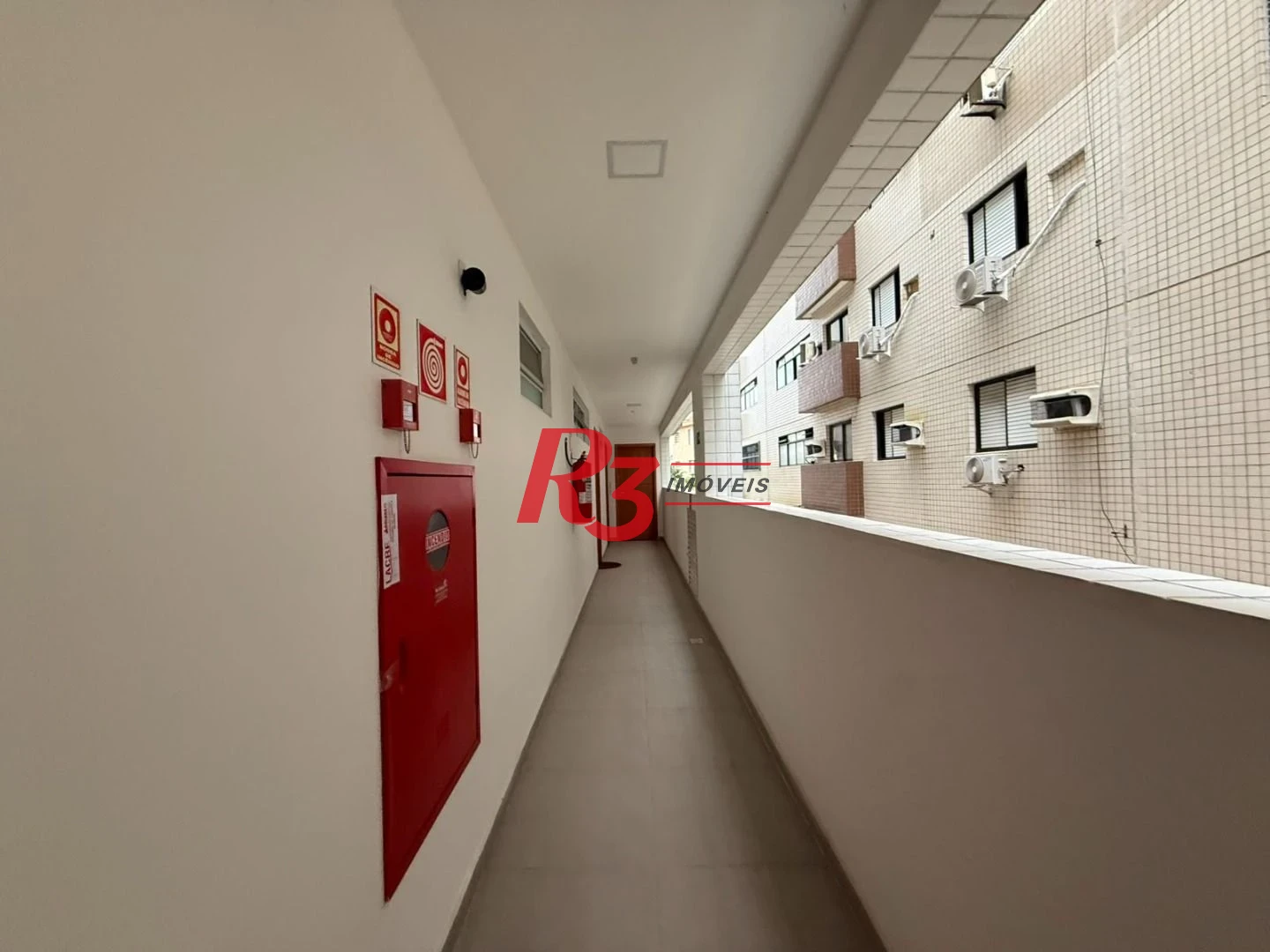 Apartamento com 2 dormitórios à venda, 70 m² por R$ 540.000,00 - Macuco - Santos/SP