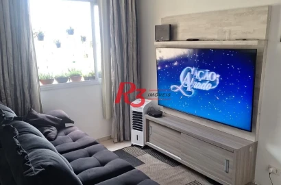 Apartamento com 2 dormitórios à venda, 58 m² por R$ 300.000,00 - Saboó - Santos/SP