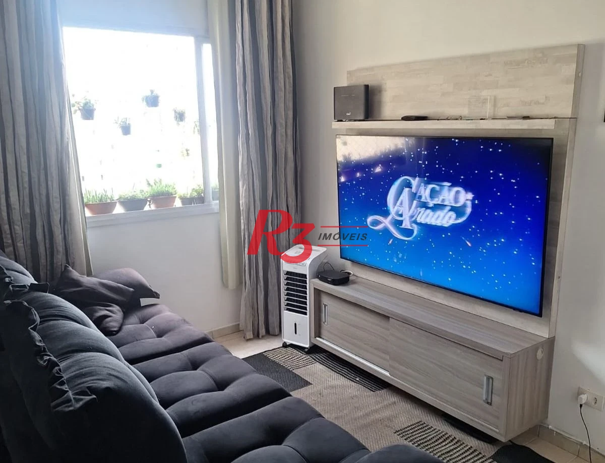 Apartamento com 2 dormitórios à venda, 58 m² por R$ 300.000,00 - Saboó - Santos/SP