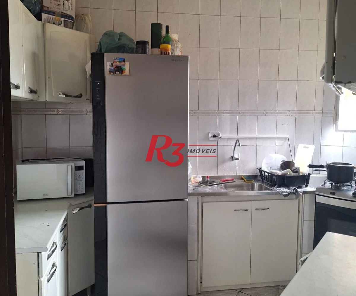 Apartamento com 2 dormitórios à venda, 58 m² por R$ 300.000,00 - Saboó - Santos/SP