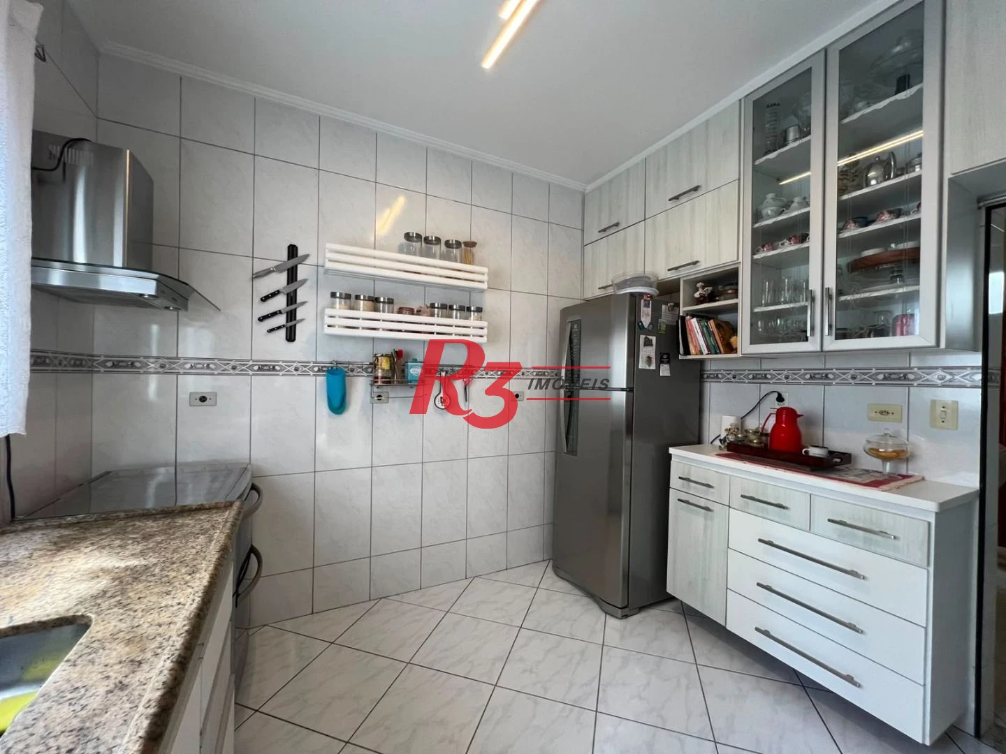 Sobrado com 3 dormitórios à venda, 164 m² por R$ 1.125.000,00 - Marapé - Santos/SP