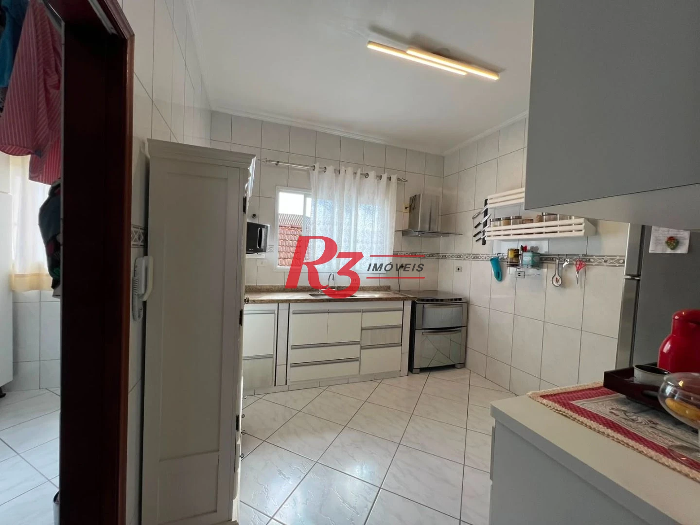 Sobrado com 3 dormitórios à venda, 164 m² por R$ 1.125.000,00 - Marapé - Santos/SP