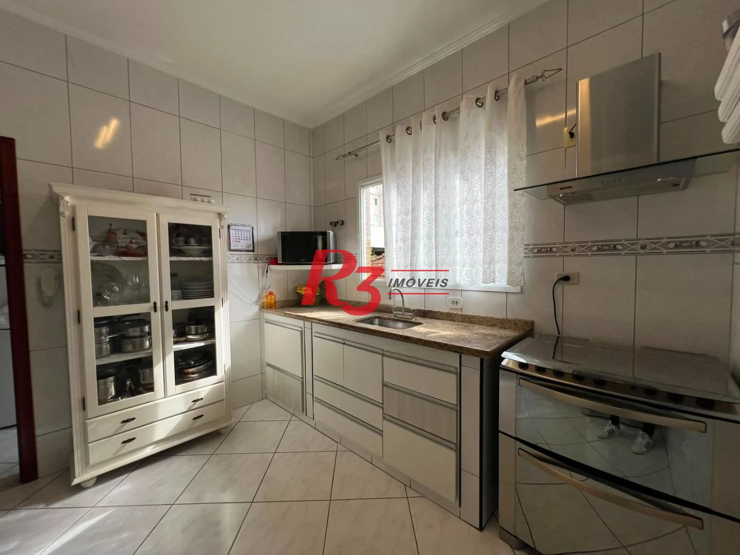 Sobrado com 3 dormitórios à venda, 164 m² por R$ 1.125.000,00 - Marapé - Santos/SP