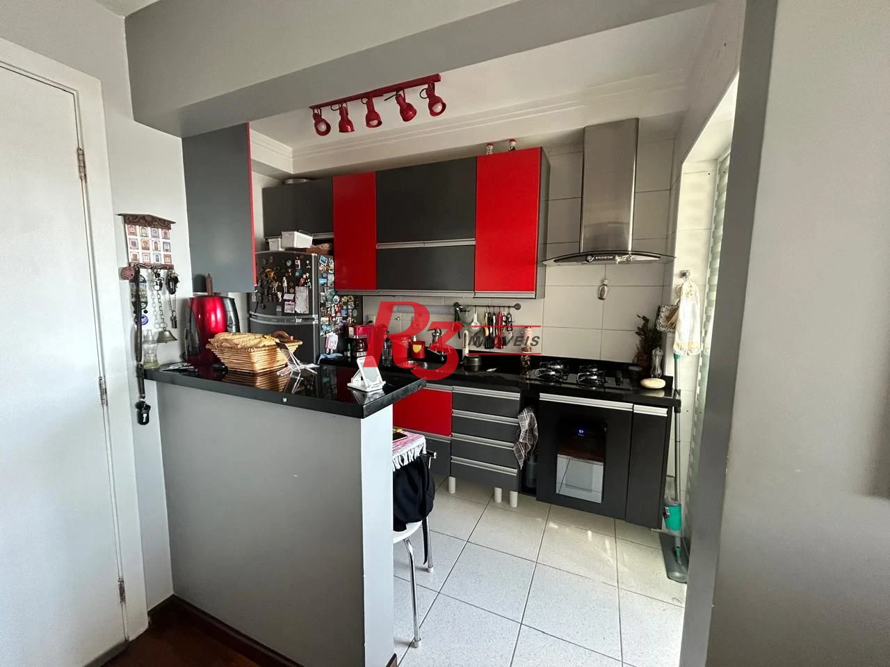 Apartamento com 2 dormitórios à venda, 64 m² por R$ 780.000,00 - Gonzaga - Santos/SP