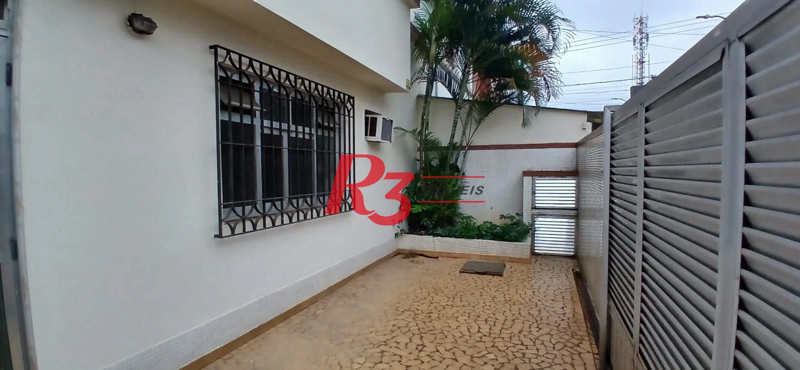 Casa com 2 dormitórios para alugar, 170 m² por R$ 5.500,02/mês - Ponta da Praia - Santos/SP