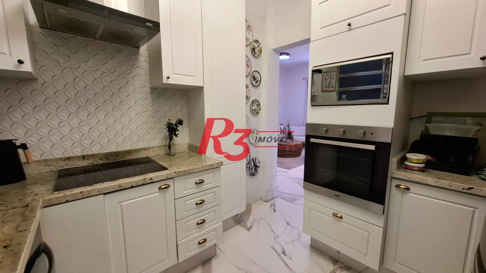 Apartamento com 3 dormitórios à venda, 103 m² por R$ 700.000,00 - Campo Grande - Santos/SP