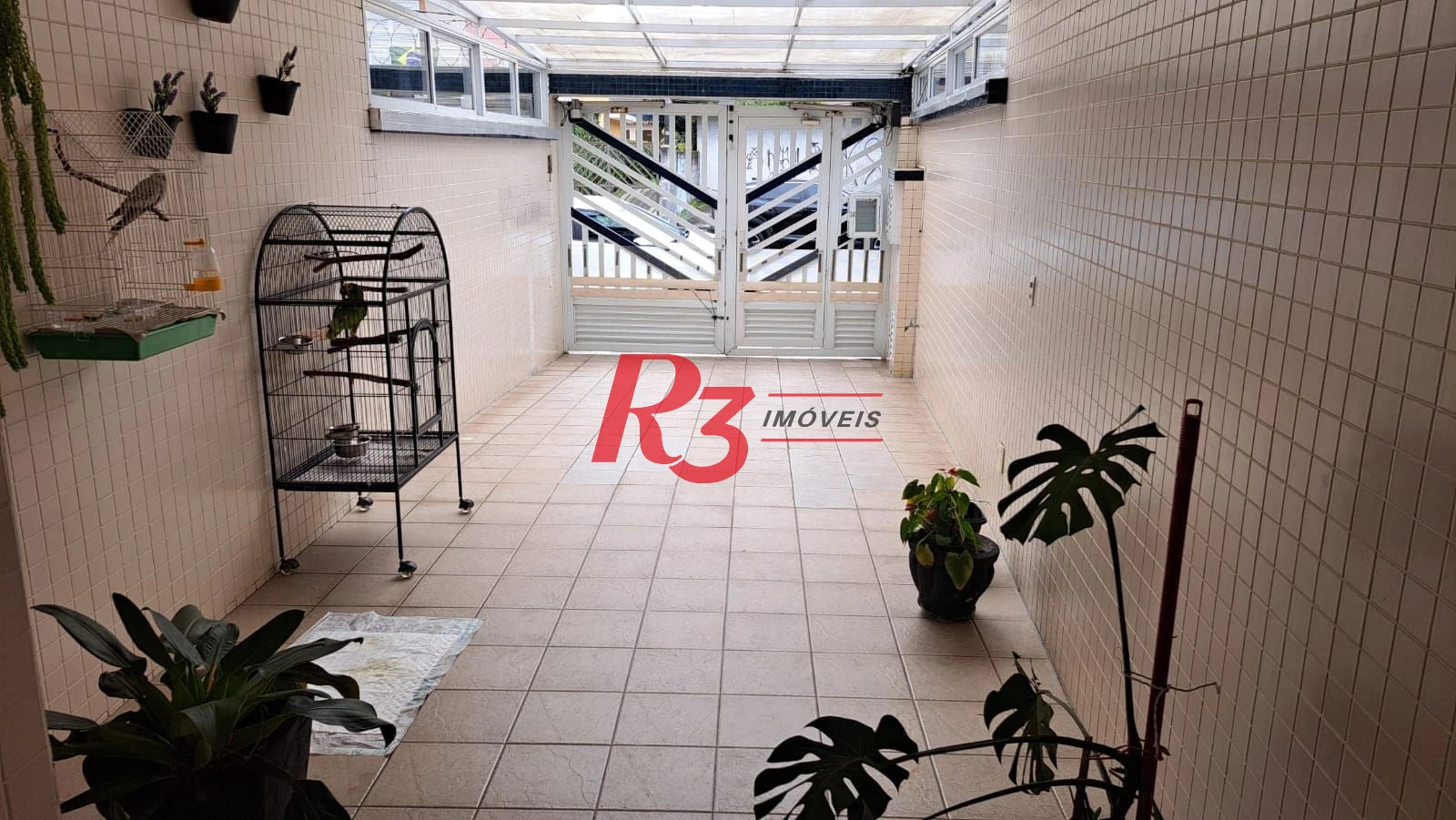 Casa com 3 dormitórios à venda, 161 m² por R$ 1.420.000,00 - Embaré - Santos/SP