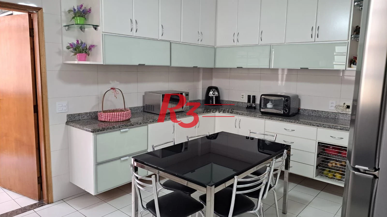 Casa com 3 dormitórios à venda, 161 m² por R$ 1.420.000,00 - Embaré - Santos/SP