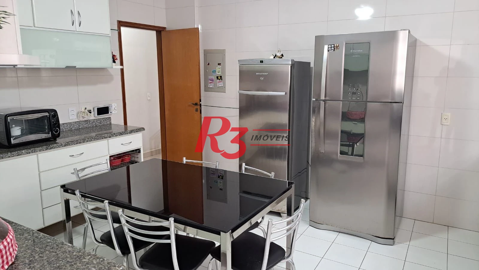 Casa com 3 dormitórios à venda, 161 m² por R$ 1.420.000,00 - Embaré - Santos/SP