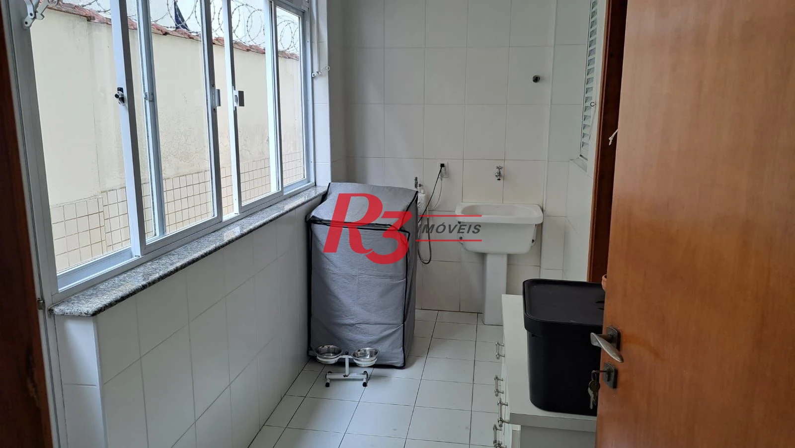 Casa com 3 dormitórios à venda, 161 m² por R$ 1.420.000,00 - Embaré - Santos/SP