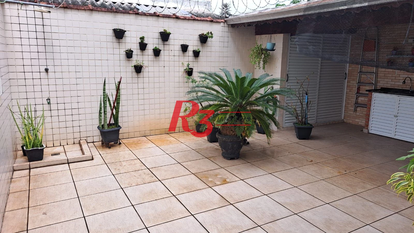 Casa com 3 dormitórios à venda, 161 m² por R$ 1.420.000,00 - Embaré - Santos/SP
