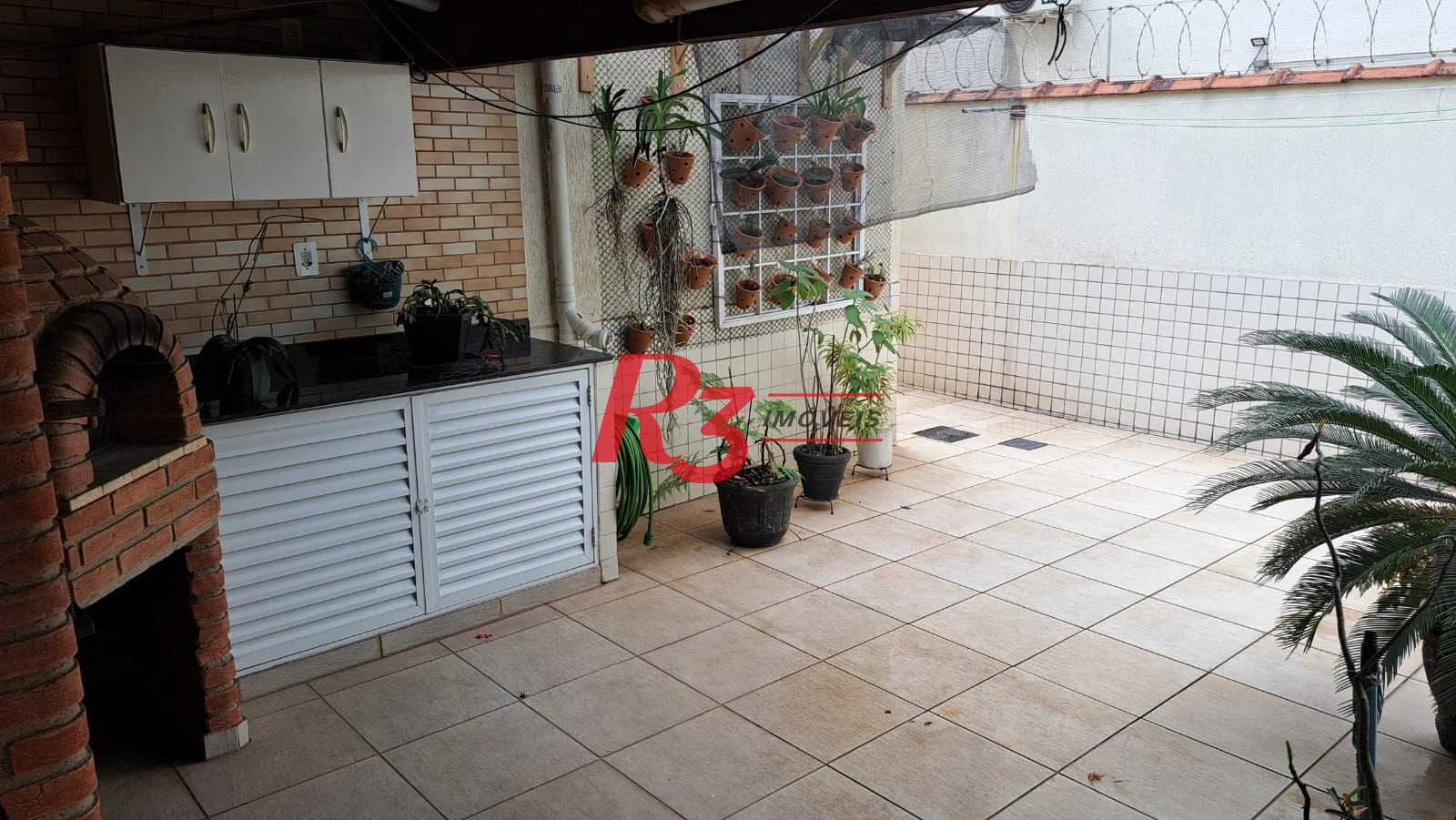 Casa com 3 dormitórios à venda, 161 m² por R$ 1.420.000,00 - Embaré - Santos/SP