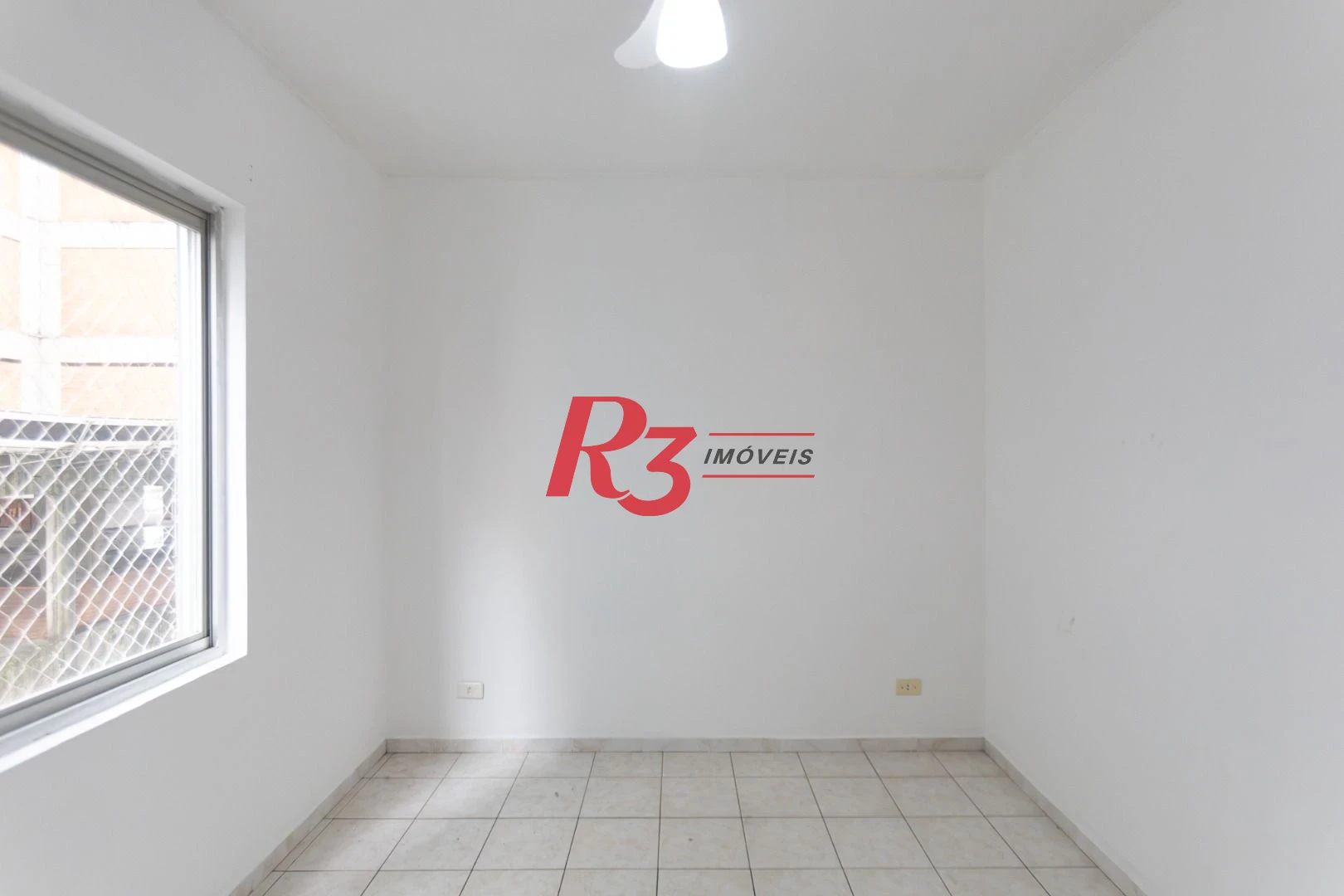 Apartamento com 2 dormitórios à venda, 83 m² por R$ 535.000,00 - Gonzaga - Santos/SP