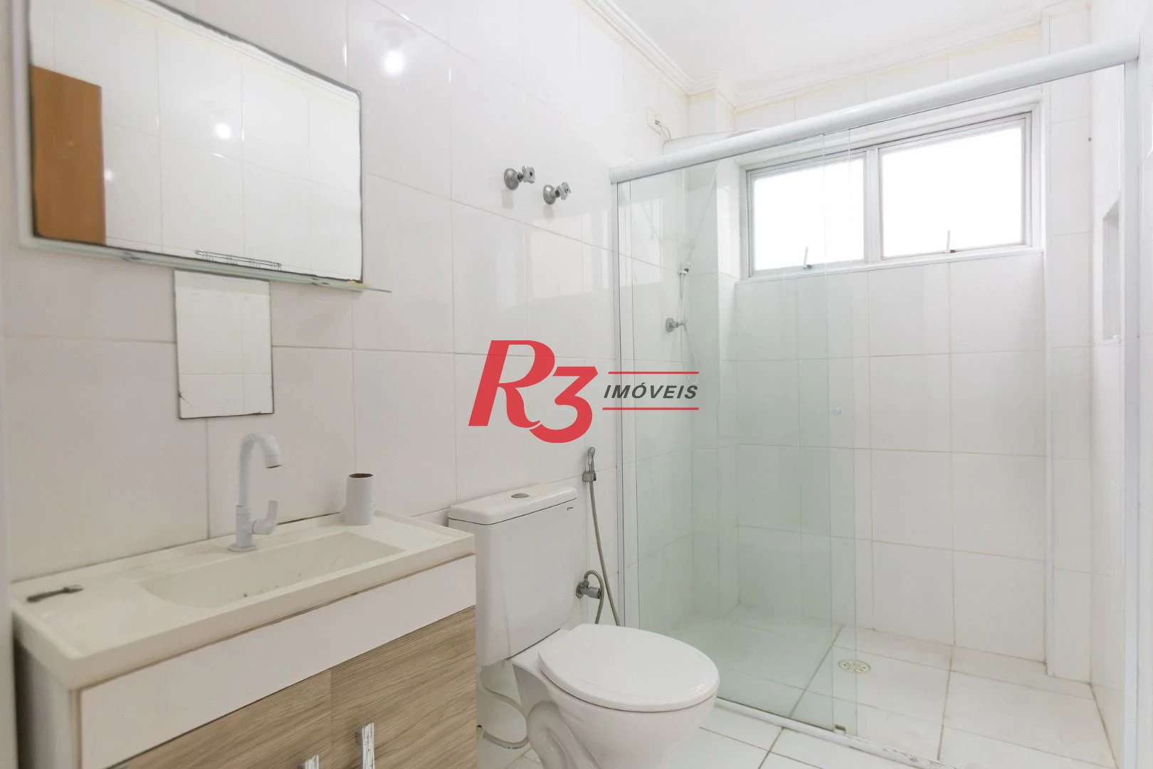 Apartamento com 2 dormitórios à venda, 83 m² por R$ 535.000,00 - Gonzaga - Santos/SP