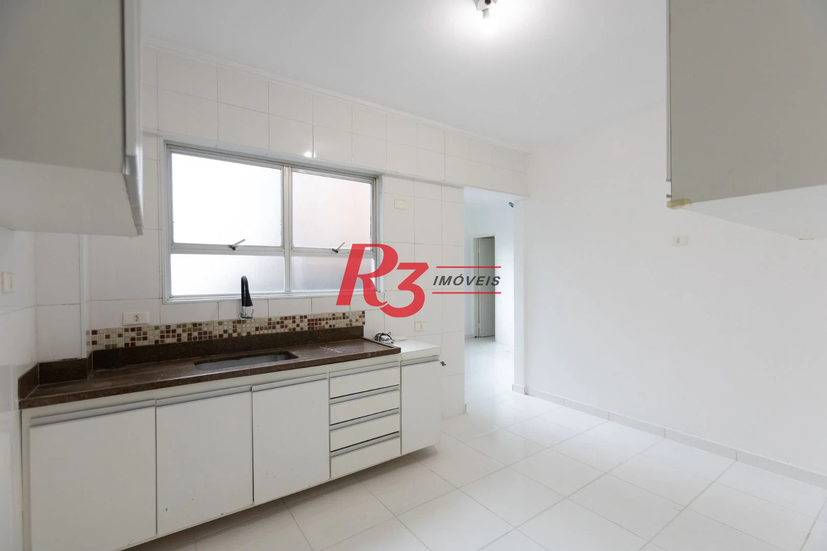 Apartamento com 2 dormitórios à venda, 83 m² por R$ 535.000,00 - Gonzaga - Santos/SP