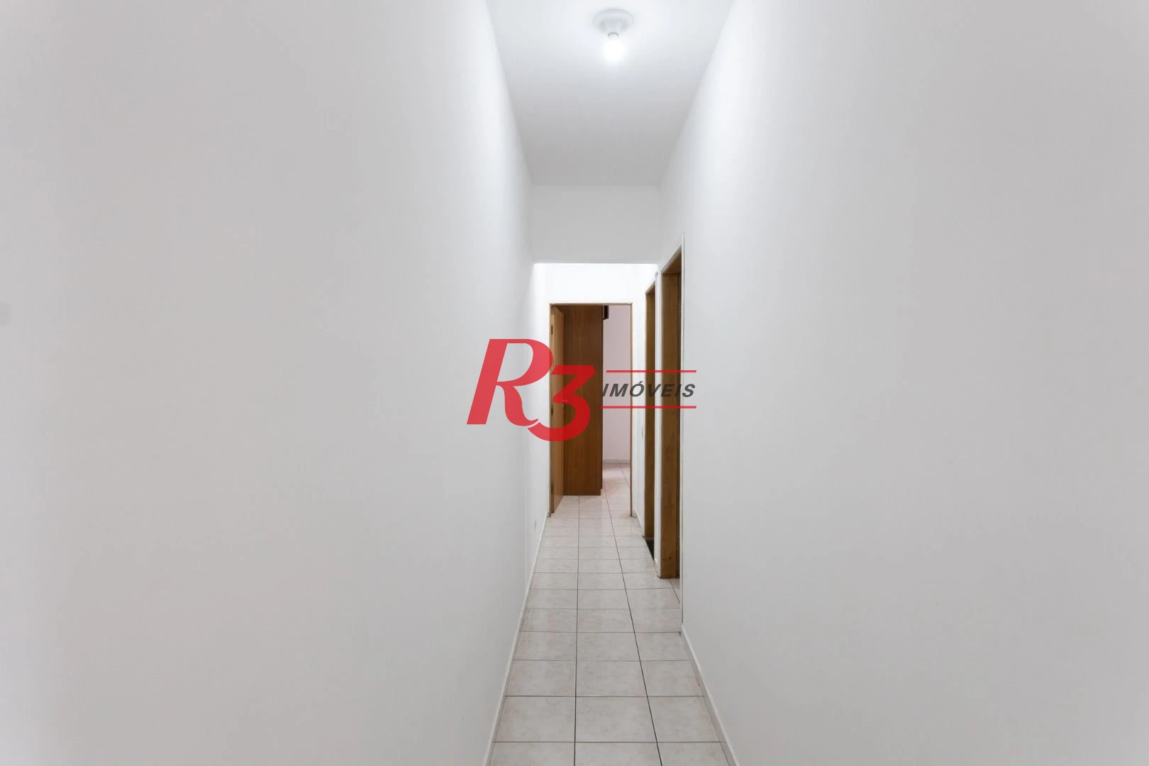 Apartamento com 2 dormitórios à venda, 83 m² por R$ 535.000,00 - Gonzaga - Santos/SP