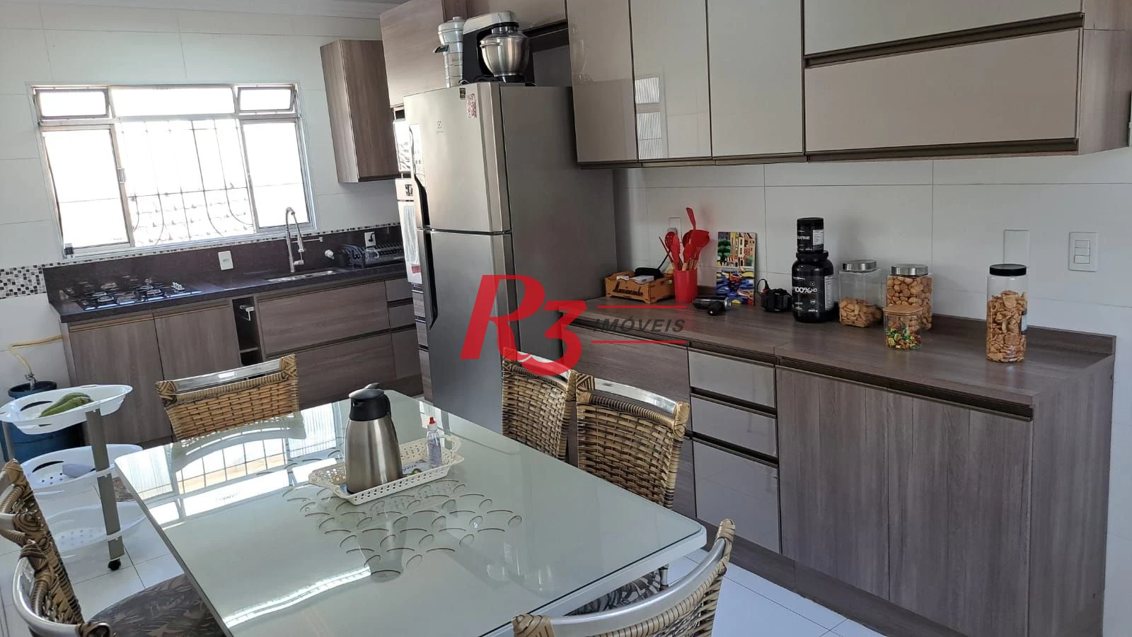 Casa com 3 dormitórios à venda, 147 m² por R$ 1.085.000,00 - Estuário - Santos/SP