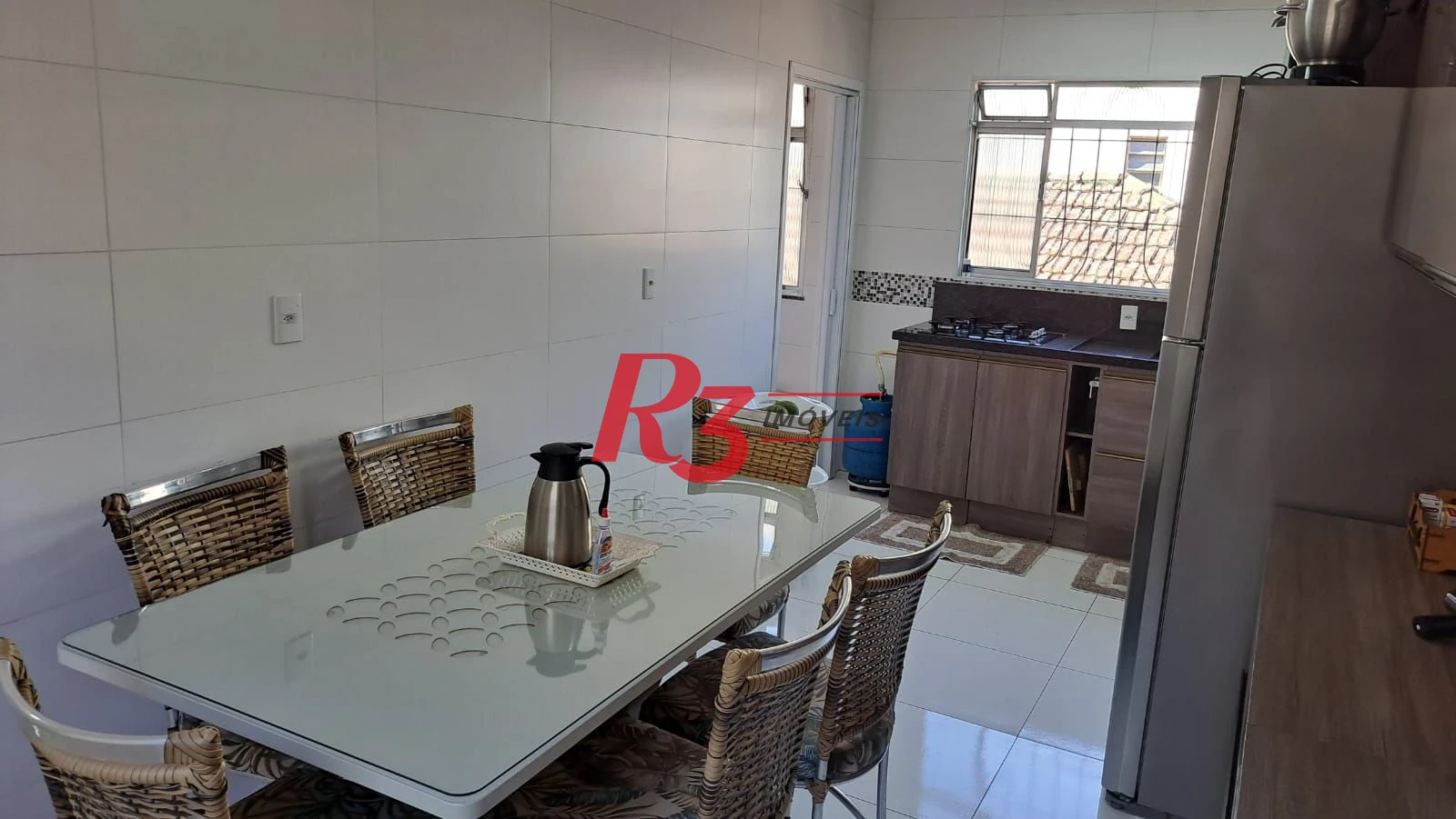 Casa com 3 dormitórios à venda, 147 m² por R$ 1.085.000,00 - Estuário - Santos/SP
