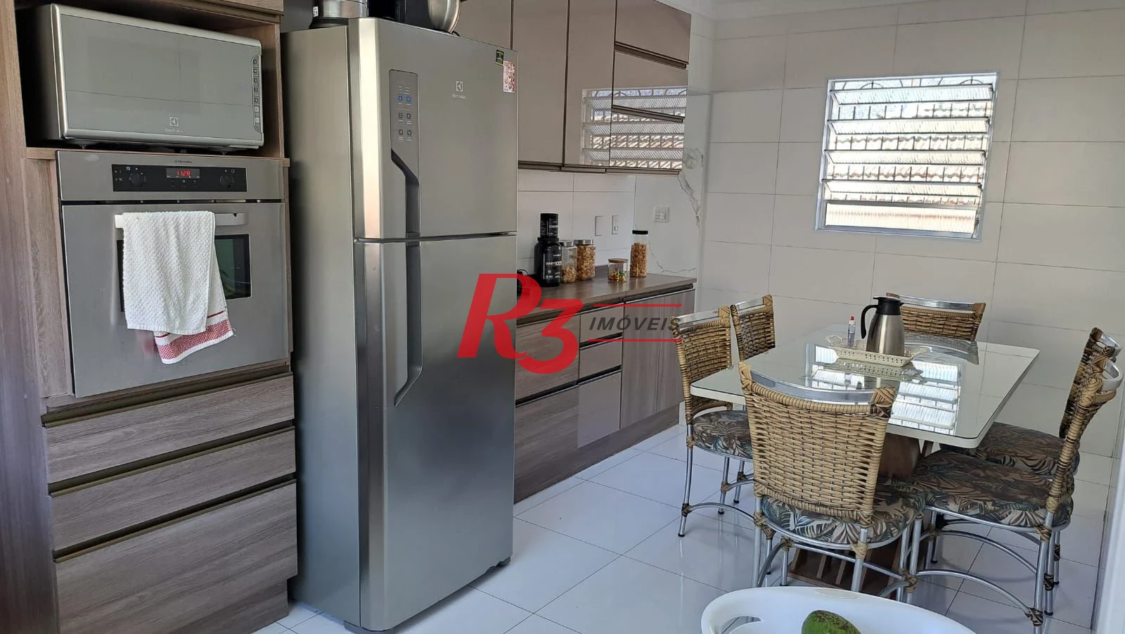 Casa com 3 dormitórios à venda, 147 m² por R$ 1.085.000,00 - Estuário - Santos/SP