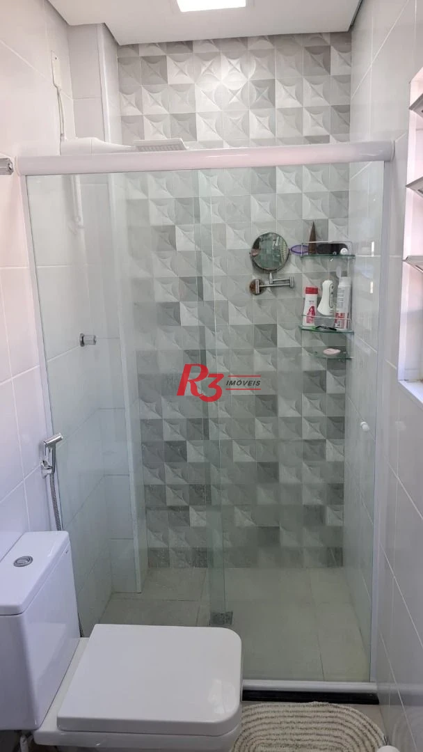 Casa com 3 dormitórios à venda, 147 m² por R$ 1.085.000,00 - Estuário - Santos/SP