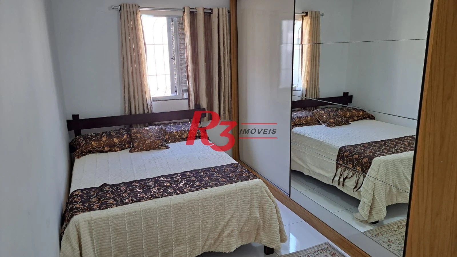 Casa com 3 dormitórios à venda, 147 m² por R$ 1.085.000,00 - Estuário - Santos/SP