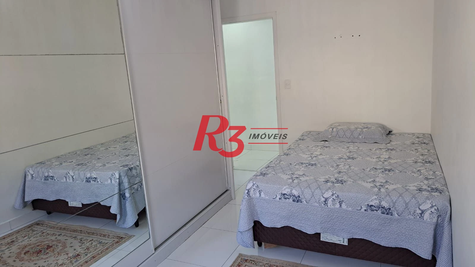 Casa com 3 dormitórios à venda, 147 m² por R$ 1.085.000,00 - Estuário - Santos/SP