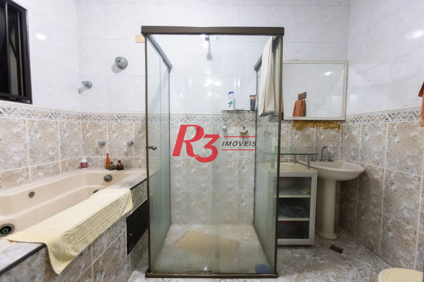 Casa com 3 dormitórios à venda, 242 m² por R$ 2.100.000,00 - Embaré - Santos/SP