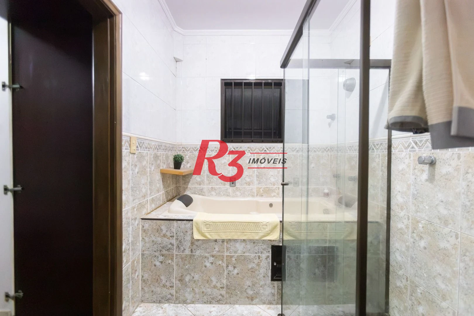 Casa com 3 dormitórios à venda, 242 m² por R$ 2.100.000,00 - Embaré - Santos/SP