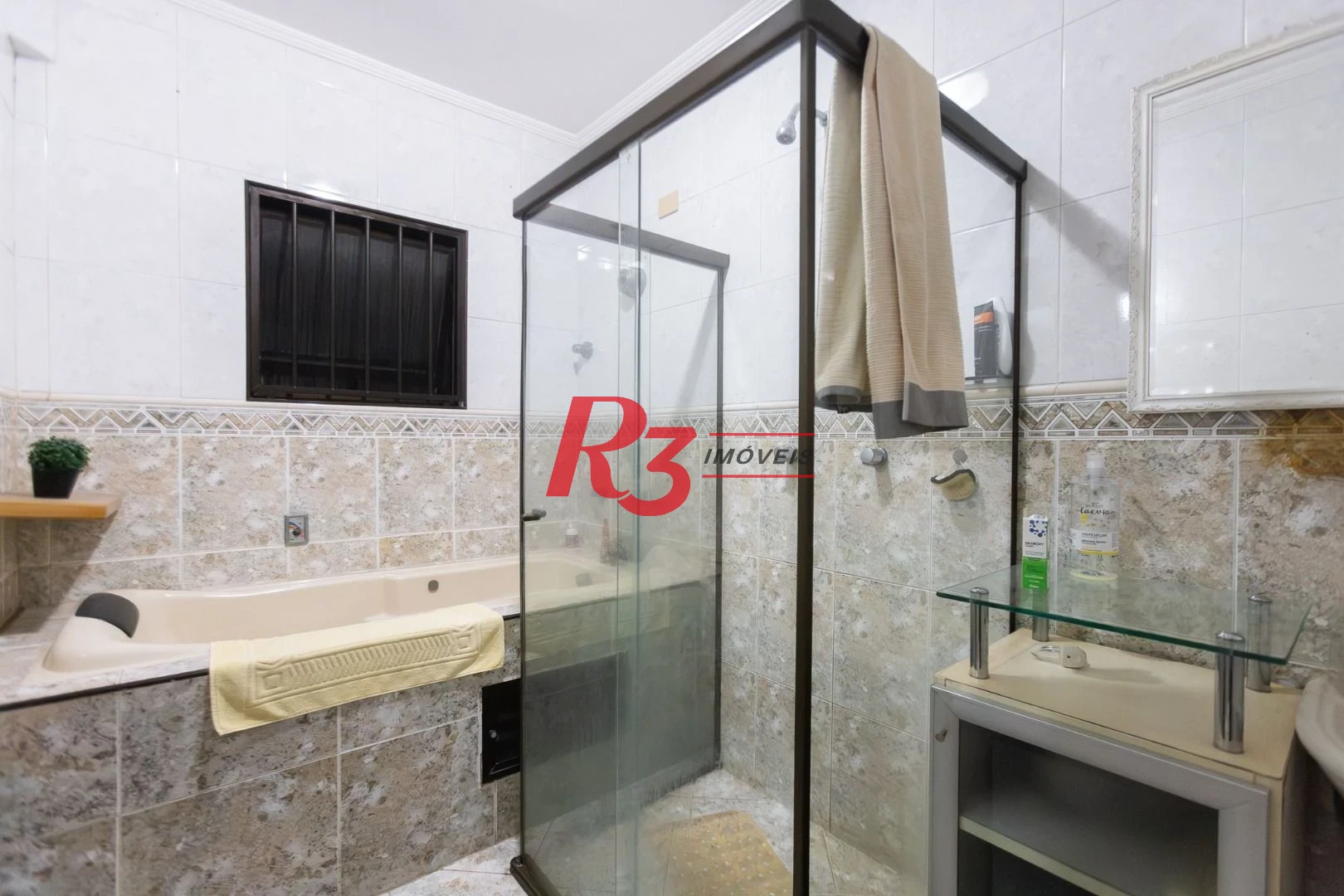 Casa com 3 dormitórios à venda, 242 m² por R$ 2.100.000,00 - Embaré - Santos/SP