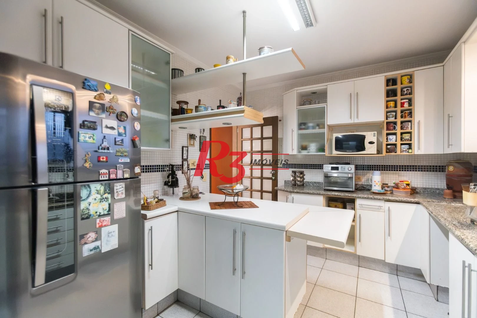 Casa com 3 dormitórios à venda, 242 m² por R$ 2.100.000,00 - Embaré - Santos/SP