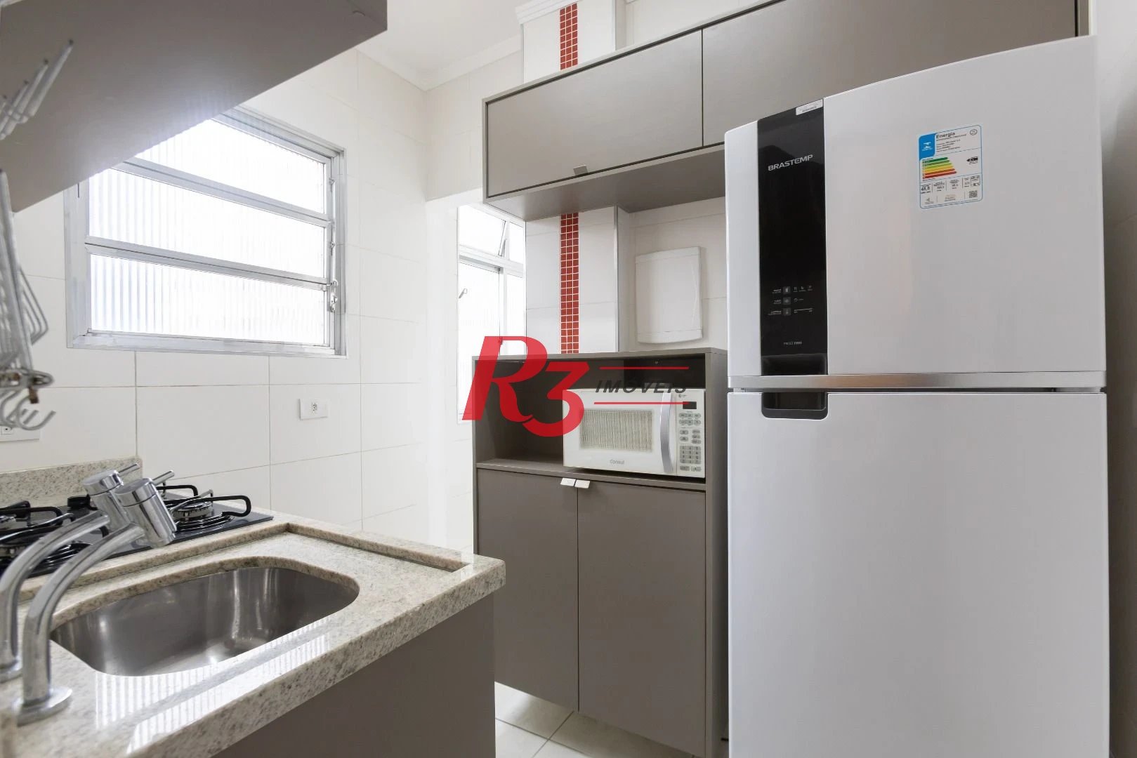 Apartamento com 1 dormitório para alugar, 40 m² por R$ 3.900,00/mês - Gonzaga - Santos/SP