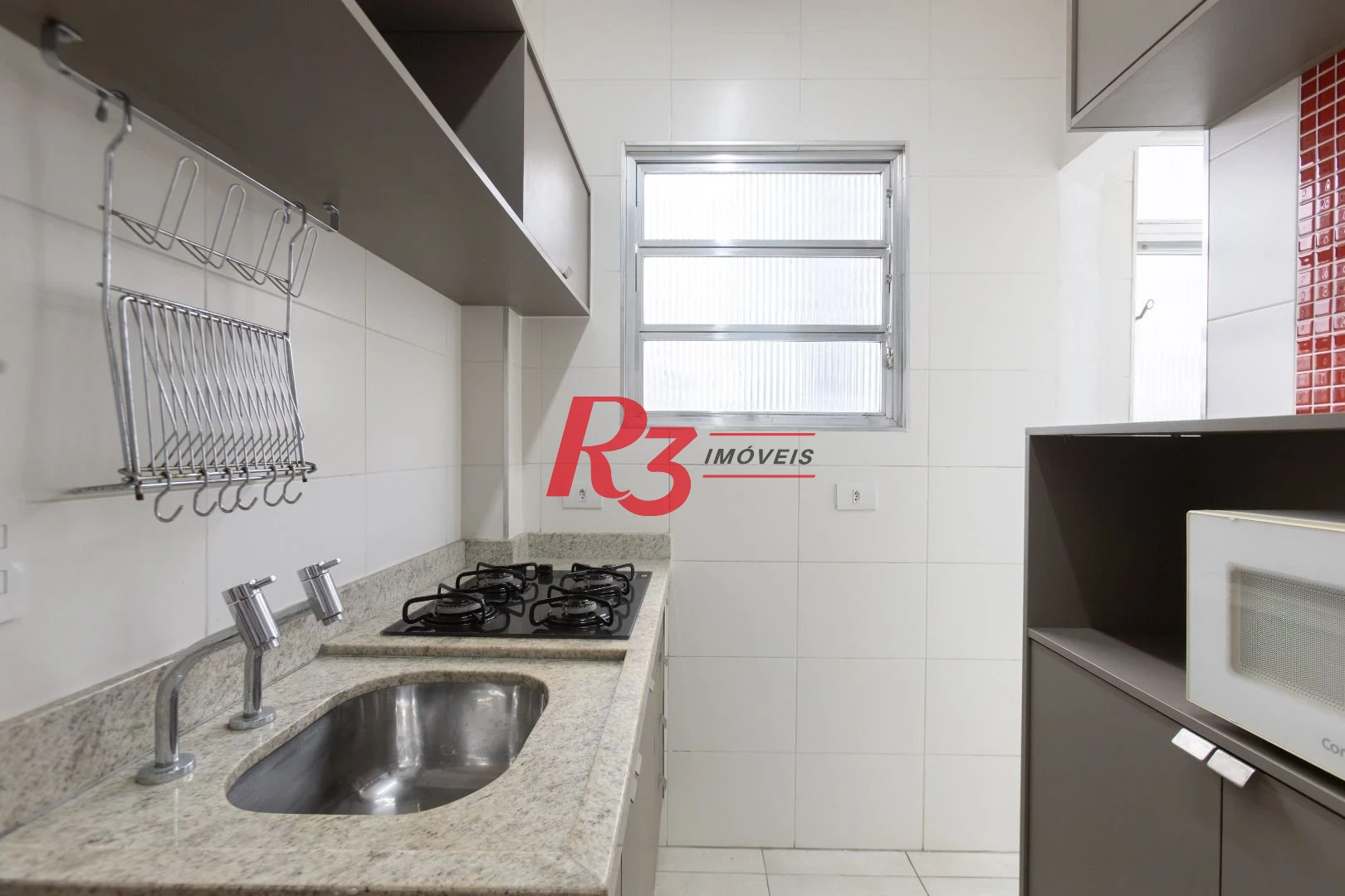 Apartamento com 1 dormitório para alugar, 40 m² por R$ 3.900,00/mês - Gonzaga - Santos/SP