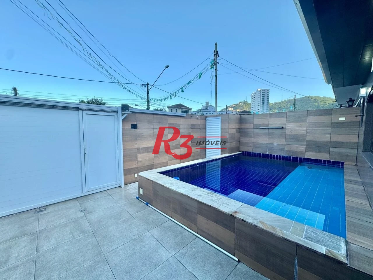 Casa com 3 dormitórios, 165 m² - venda por R$ 1.400.000,00 ou aluguel por R$ 7.335,11/mês - Marapé - Santos/SP