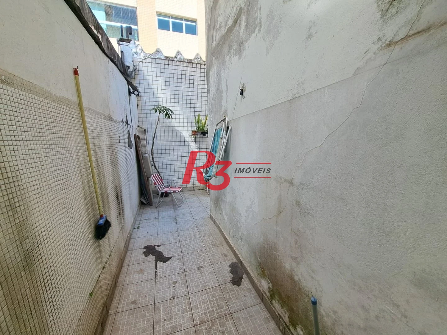 Apartamento térreo com 3 dormitórios à venda, 80 m² por R$ 575.000 - Boqueirão - Santos/SP