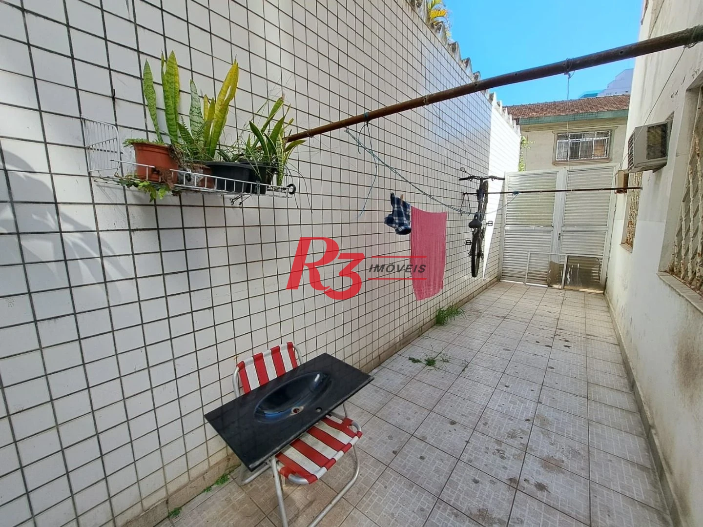 Apartamento térreo com 3 dormitórios à venda, 80 m² por R$ 575.000 - Boqueirão - Santos/SP