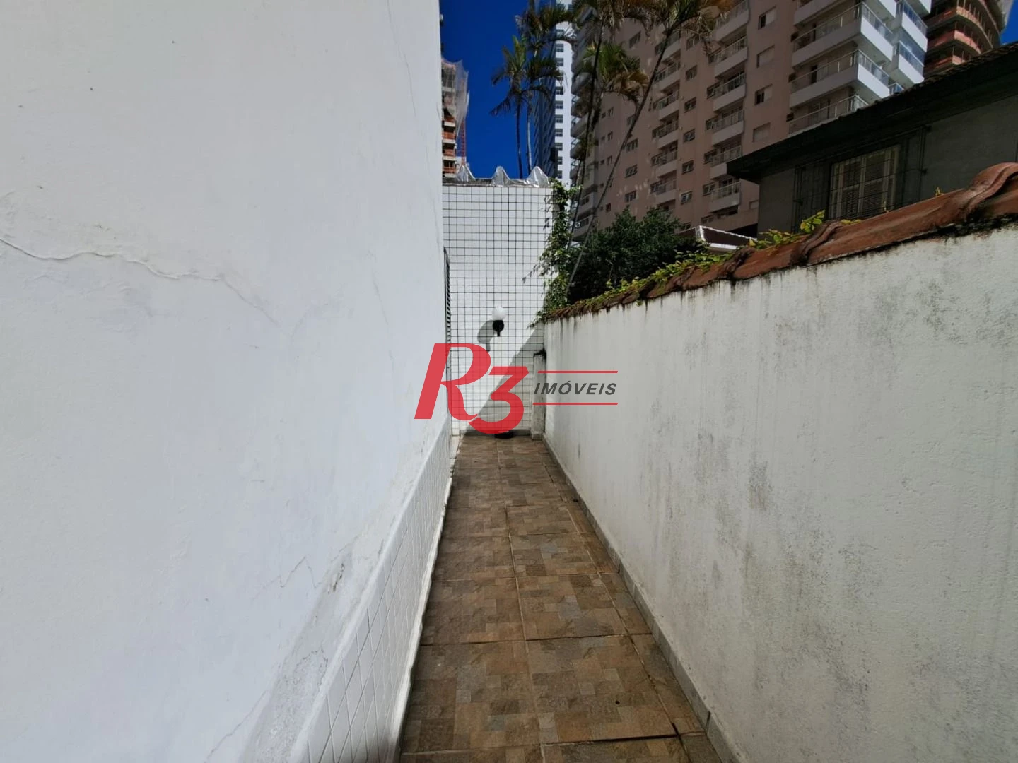Apartamento térreo com 3 dormitórios à venda, 80 m² por R$ 575.000 - Boqueirão - Santos/SP
