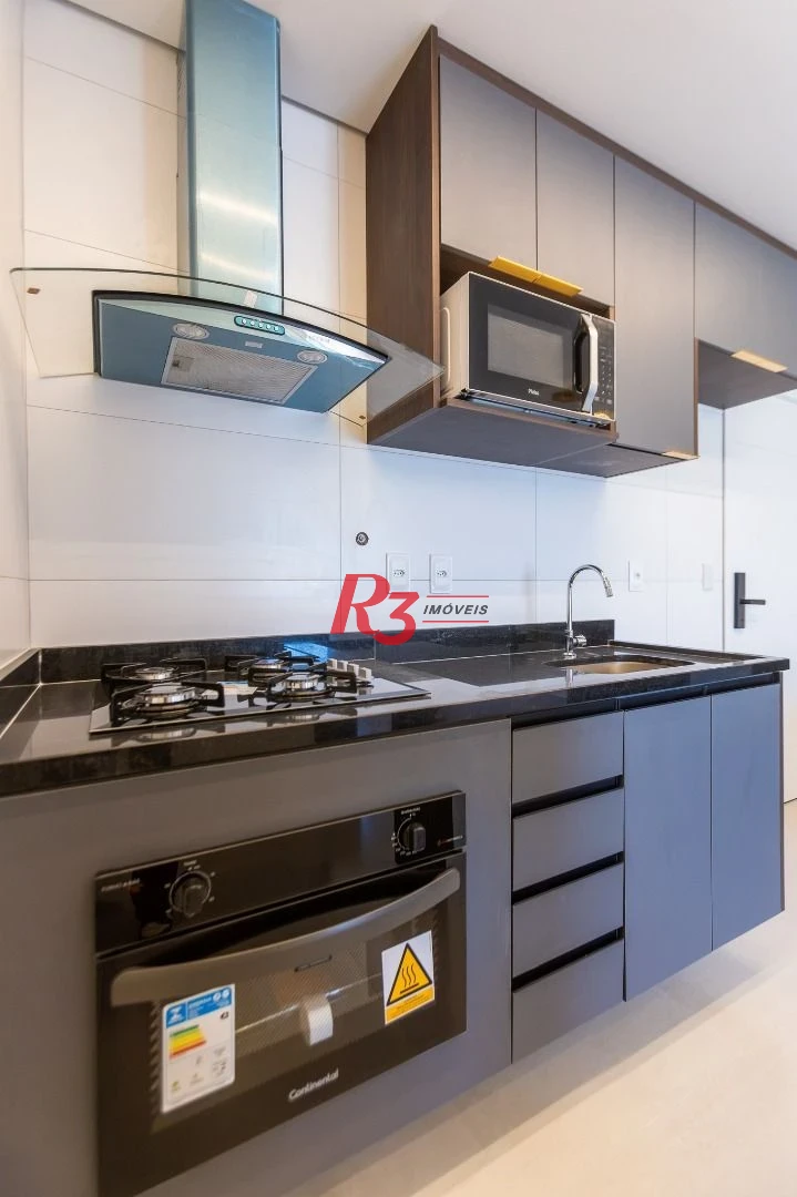 Apartamento com 2 dormitórios para alugar, 56 m² por R$ 4.800,02/mês - Macuco - Santos/SP