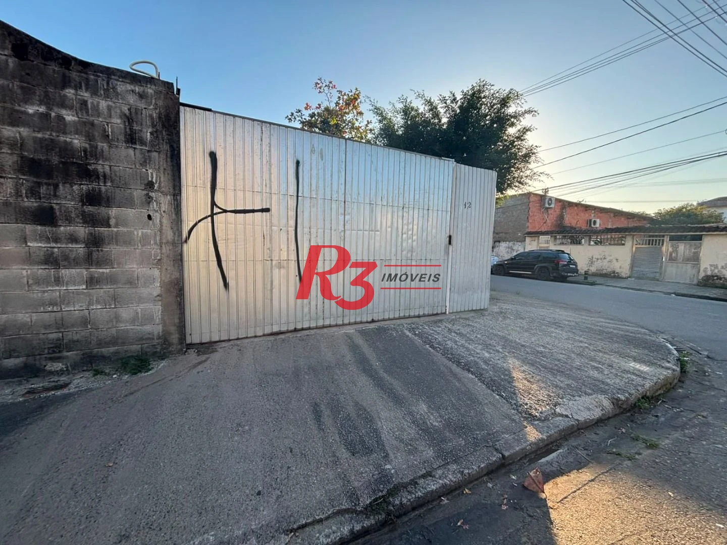 Terreno à venda, 128 m² por R$ 350.000,00 - Caneleira - Santos/SP