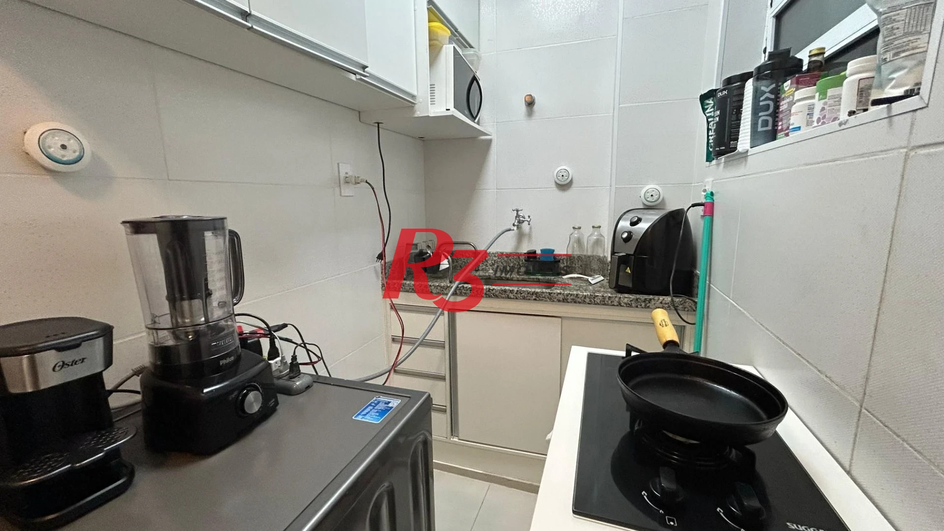 Kitnet com 1 dormitório à venda, 42 m² por R$ 300.000,00 - Embaré - Santos/SP