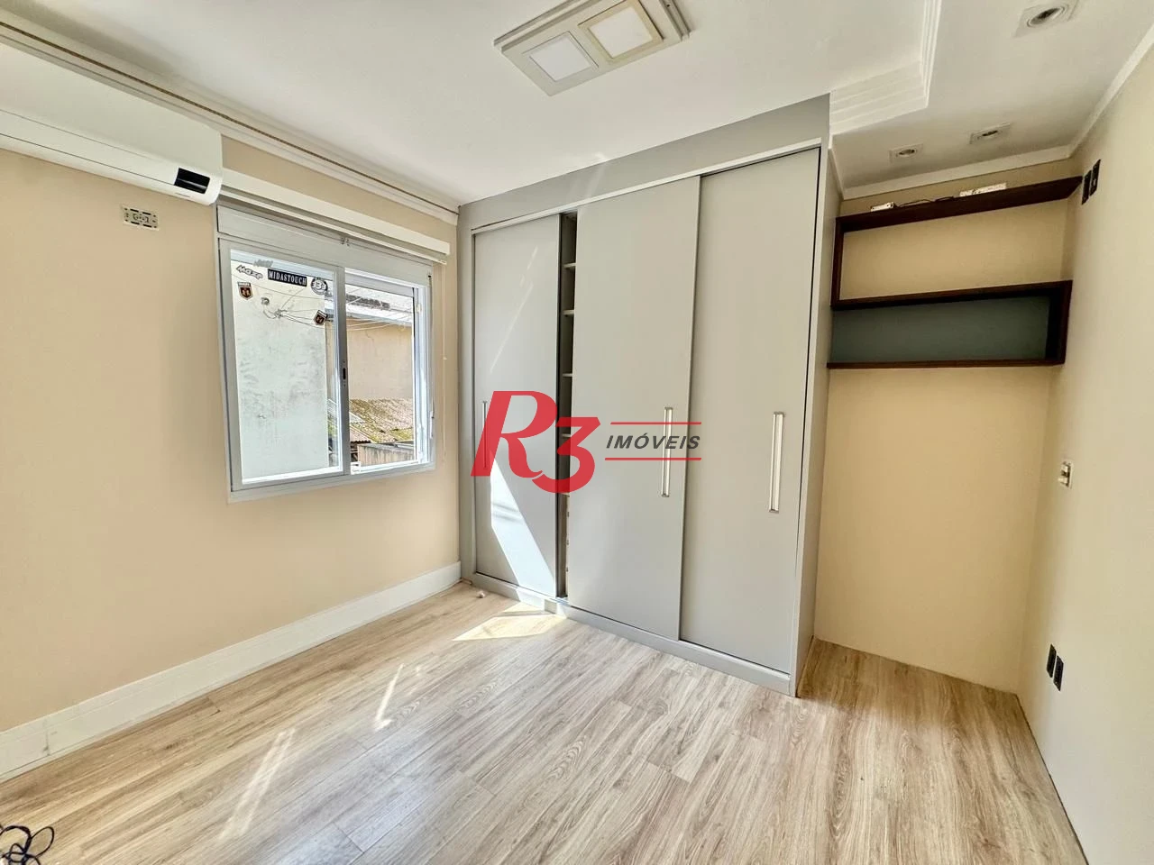 Sobrado com 3 dormitórios para alugar, 108 m² por R$ 5.500,00/mês - Embaré - Santos/SP