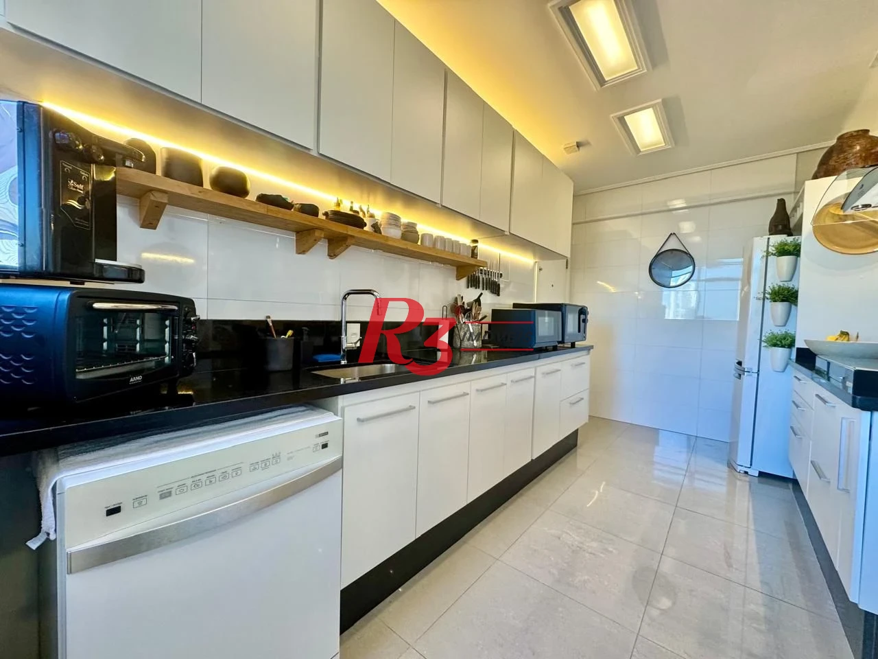 Apartamento com 2 dormitórios à venda, 110 m² por R$ 950.000,00 - Gonzaga - Santos/SP