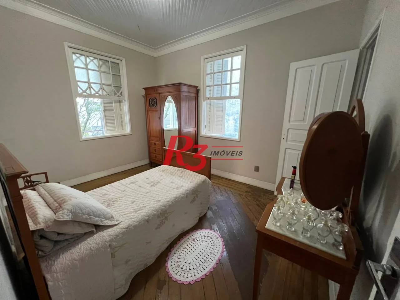 Sobrado com 3 dormitórios à venda, 226 m² por R$ 900.000,00 - Vila Matias - Santos/SP