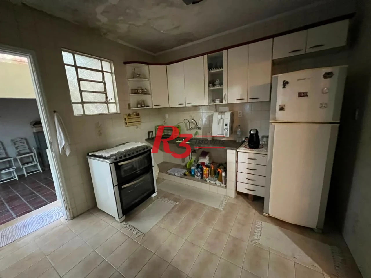 Sobrado com 3 dormitórios à venda, 226 m² por R$ 900.000,00 - Vila Matias - Santos/SP