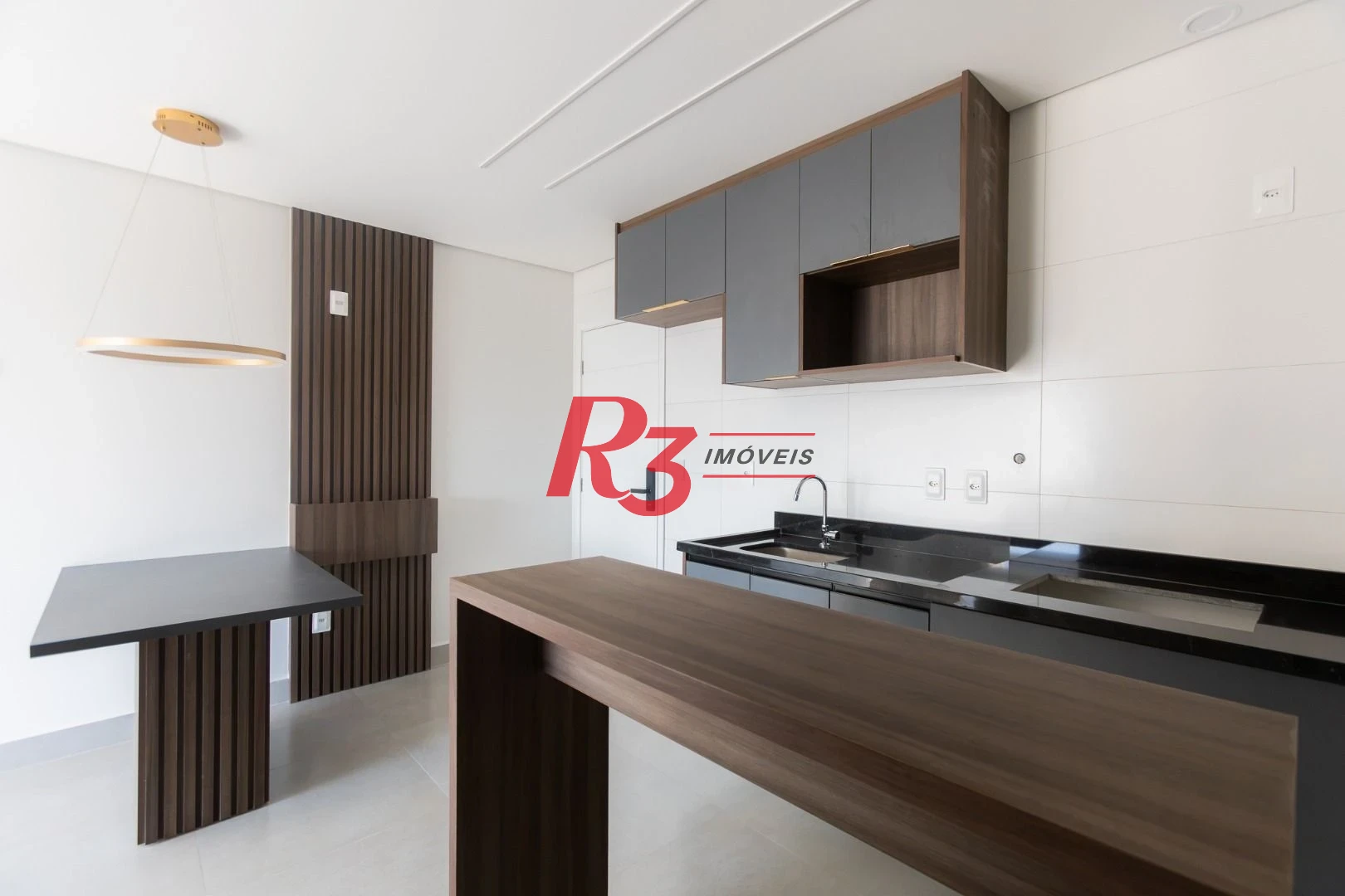 Apartamento com 2 dormitórios à venda, 56 m² por R$ 750.000,00 - Macuco - Santos/SP