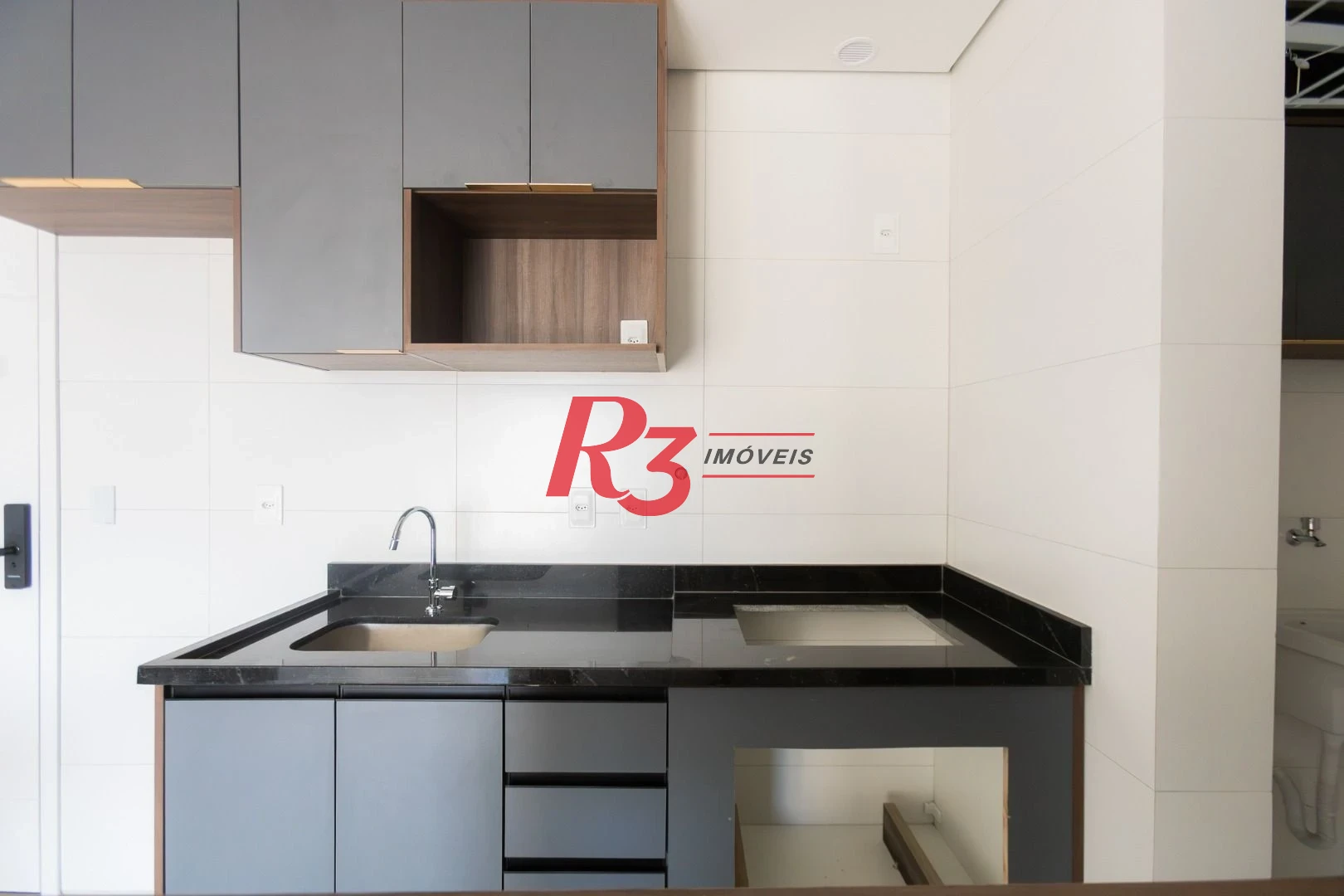 Apartamento com 2 dormitórios à venda, 56 m² por R$ 750.000,00 - Macuco - Santos/SP
